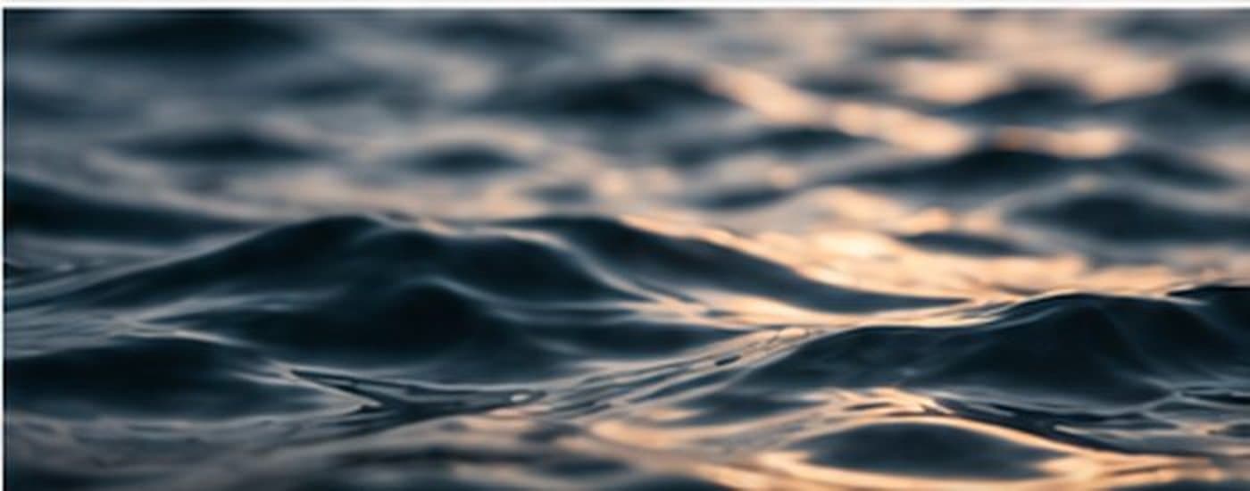 Calm water with reflected light